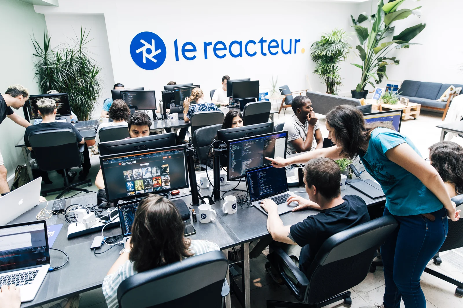 Élèves du bootcamp Le Reacteur en session de formation